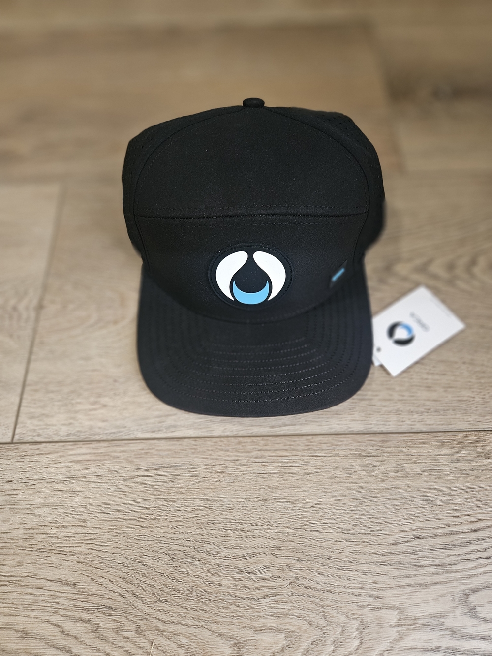 Orca Black Snapback Hat with Blue Accent